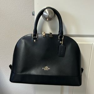 Coach hand bag. No strap. Excellent condition
